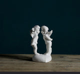 Angel plaster sculpture of creative characters