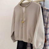 Large size fake two-piece hatless short sweatshirt for women in early autumn 2025 new loose and chic slim long-sleeved top